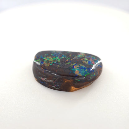 6.72 Ct Boulder Opal Freeform Cabochon – Multicolor Fire on Dark Matrix