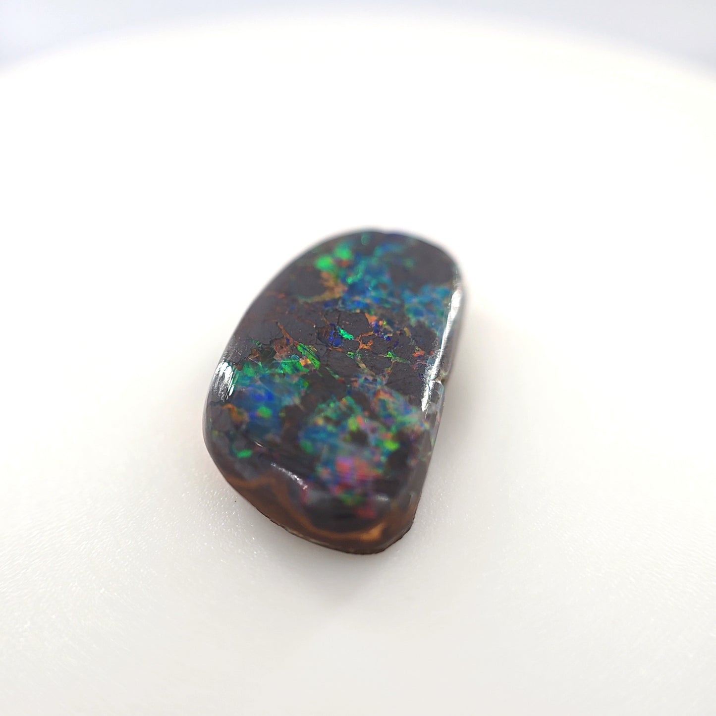 6.72 Ct Boulder Opal Freeform Cabochon – Multicolor Fire on Dark Matrix