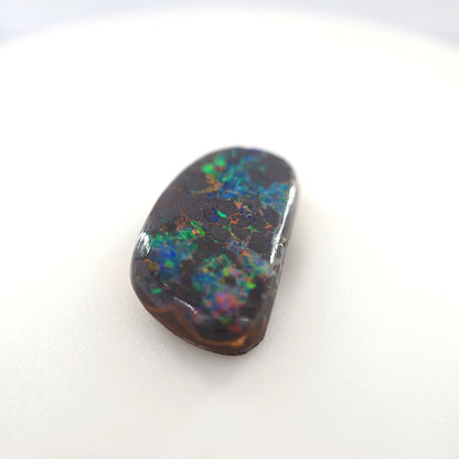 6.72 Ct Boulder Opal Freeform Cabochon – Multicolor Fire on Dark Matrix