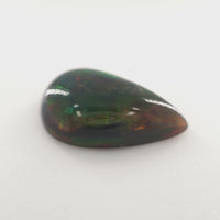 2.96 Ct Black Opal Pear Cabochon – Green Fire with Red Flashes